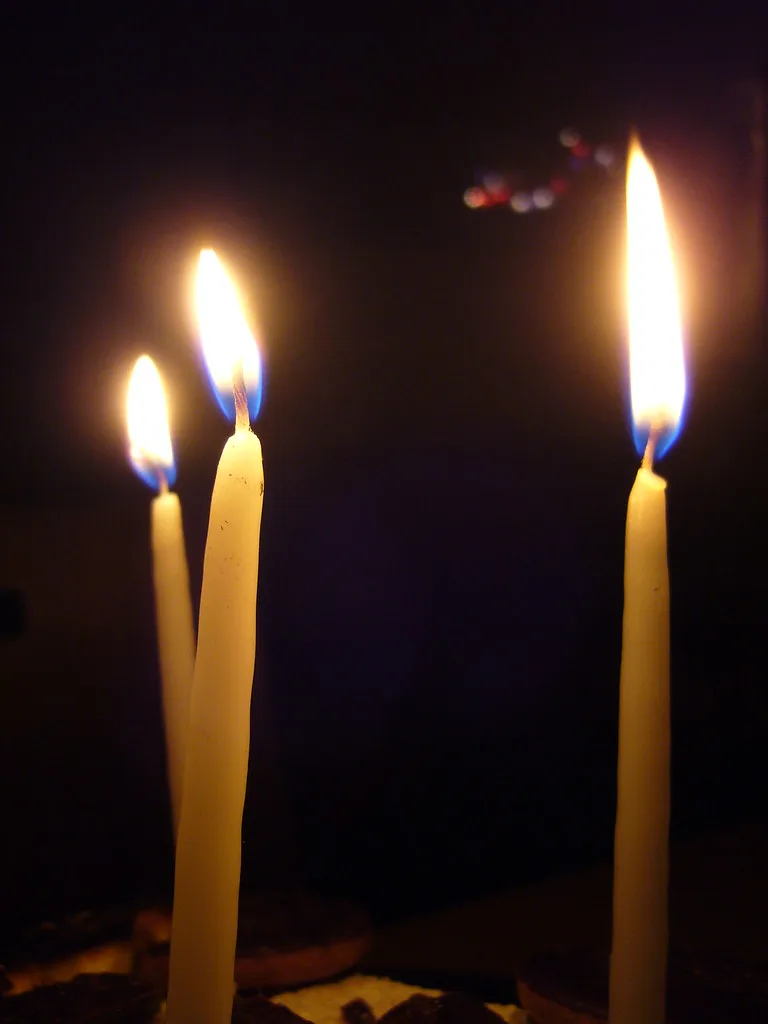 Candles glowing in the dark night
